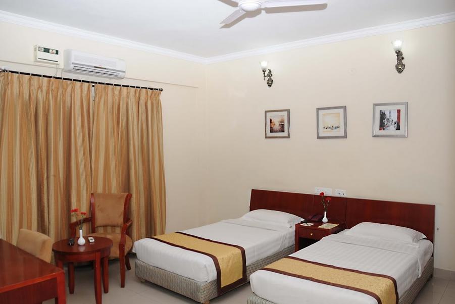 Ivory Inn Бенґалуру Номер фото